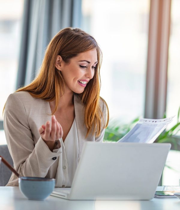 Happy businesswoman professional worker working online doing job Happy businesswoman professional worker working online doing job on laptop at desk, smiling female employee executive typing message using corporate computer software for business in modern office